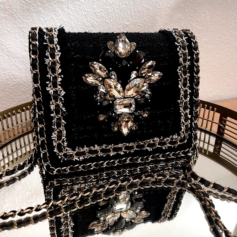Tweed crossbody bag in black and gold